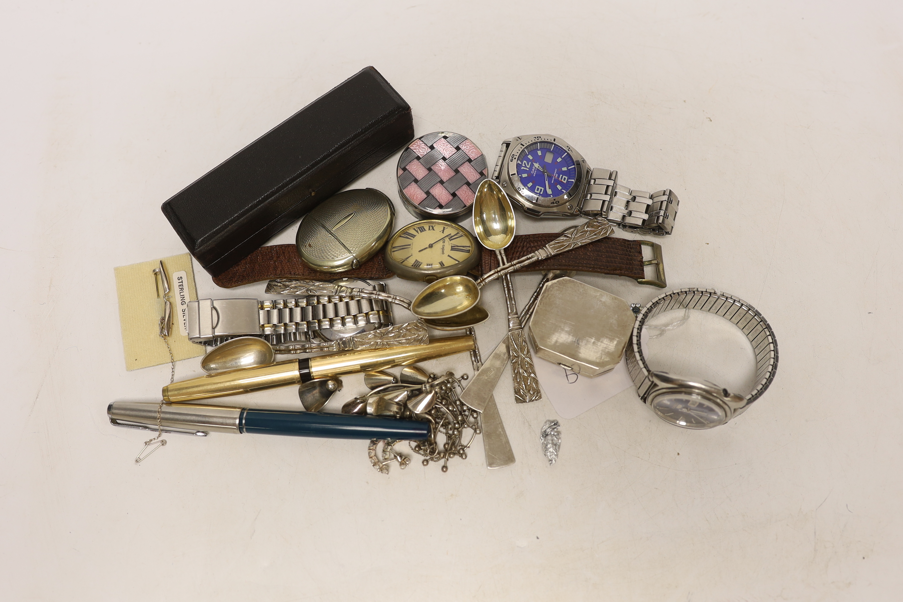 Miscellaneous items including a set of six Chinese white metal teaspoons by Wang Hing, 10.2cm, three assorted pens, silver and enamelled pill box and four assorted wrist watches including Seiko.